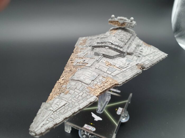 In the picture you see a battleship size space ship miniature for tabletop games called Modified ISD Chimaera Mel Miniatures
